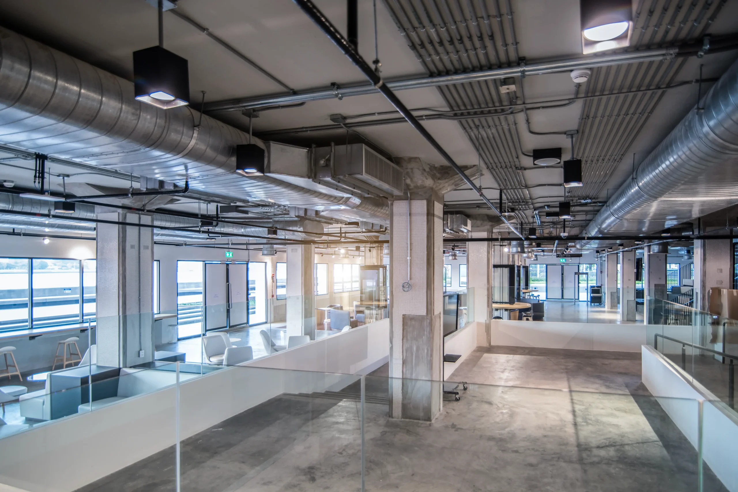 Commercial building interior with exposed ventilation and building services